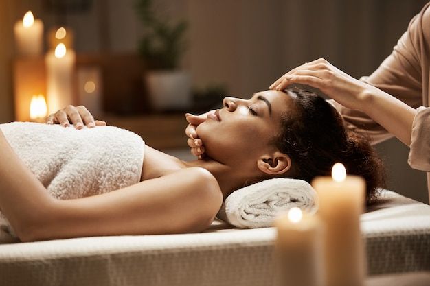 Woman enjoying relaxing face massage therapy at Holistic Luxury Spa & Salon, Arera Colony Bhopal